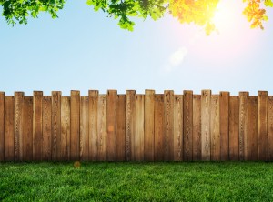 wooden-fence-against-brightly-lit-background