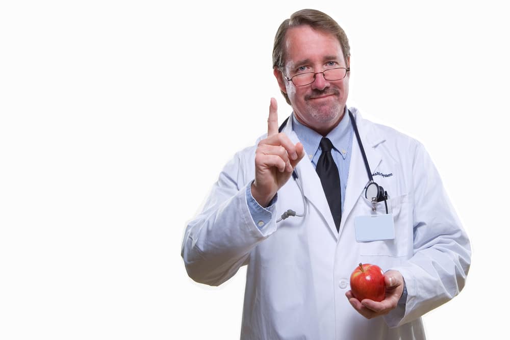 doctor-holding-red-apple