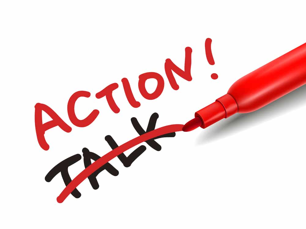 red-pen-crossing-out-the-word-talk-and-replacing-it-with-action-with-an-exclamation-mark