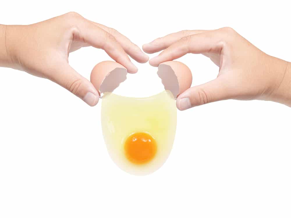 hands-cracking-open-an-egg
