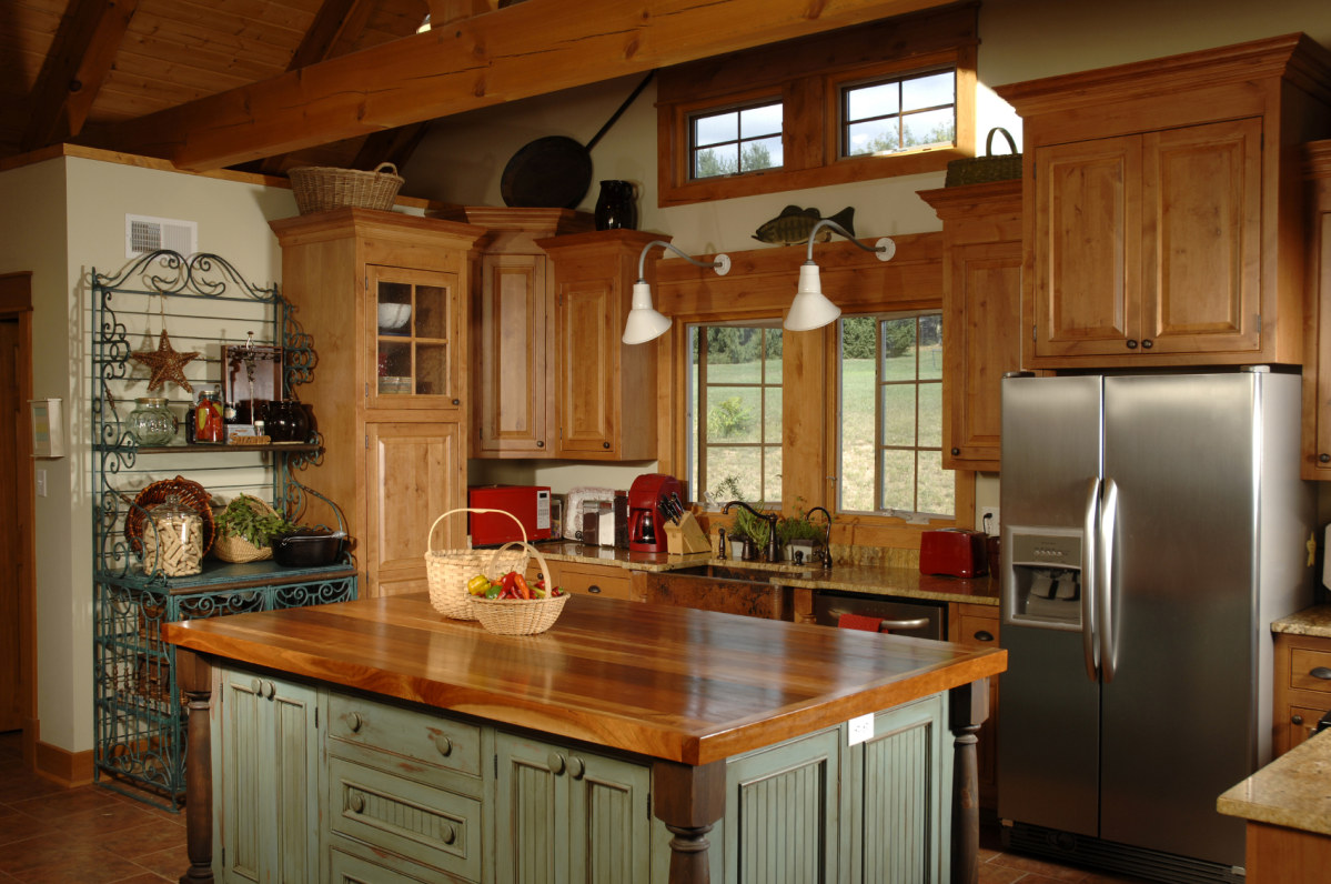 a-traditional-style-kitchen-with-wooden-features-modern-kitchen-appliances-and-a-basket-filled-with-vegetables