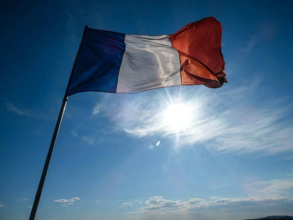 french flag flying in the wind