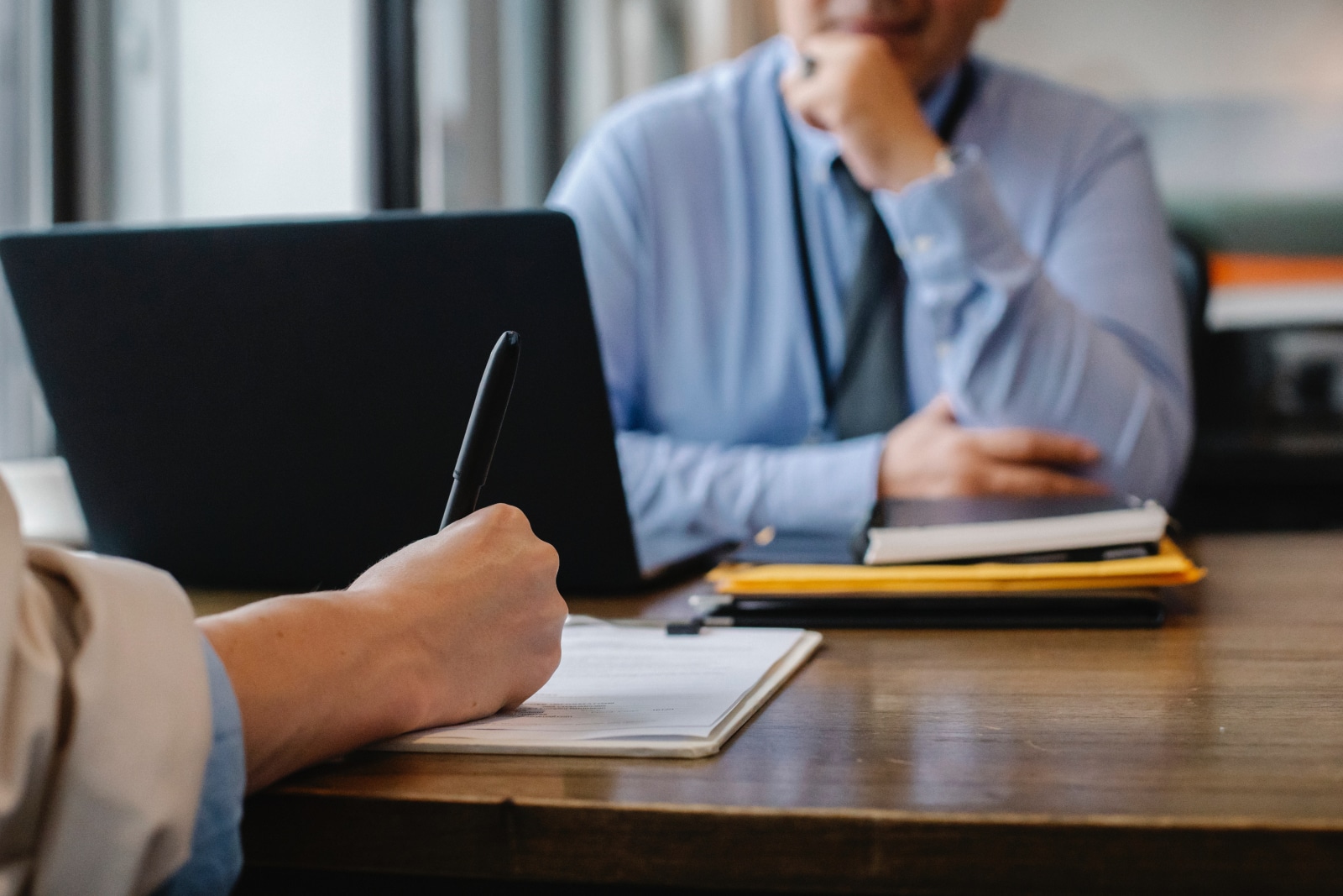 Students begin their interview sessions by knocking on the door and