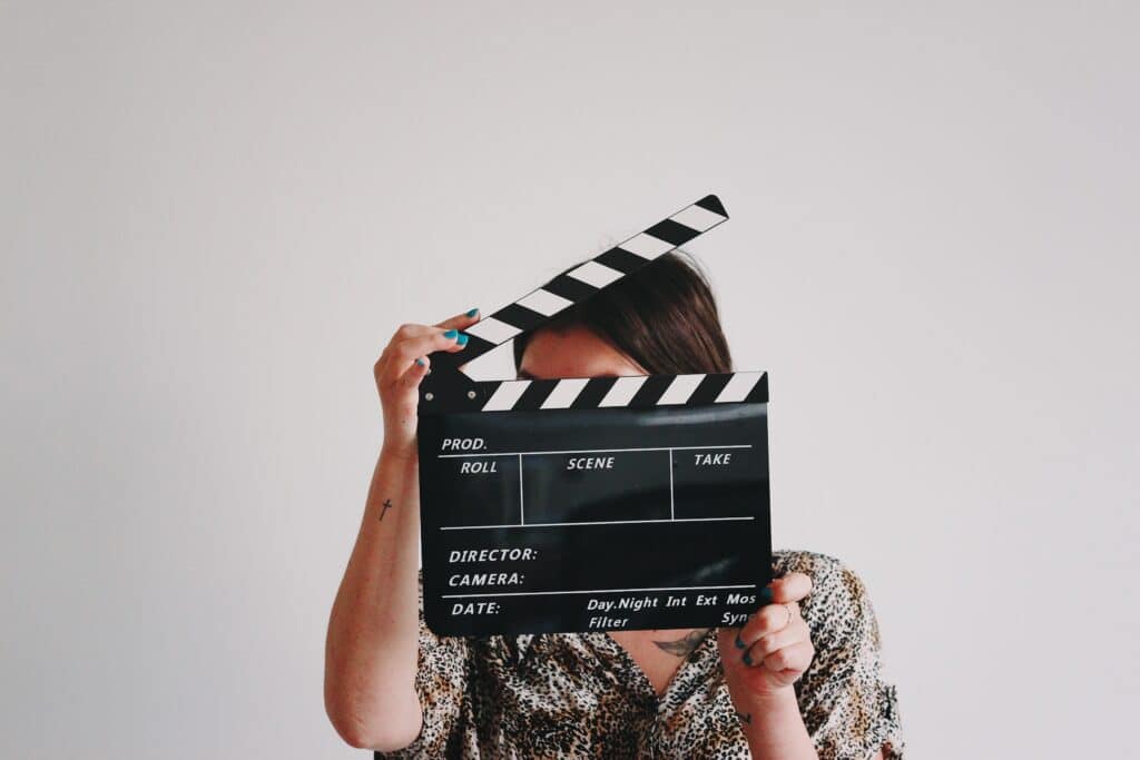 woman-with-movie-clapperboard