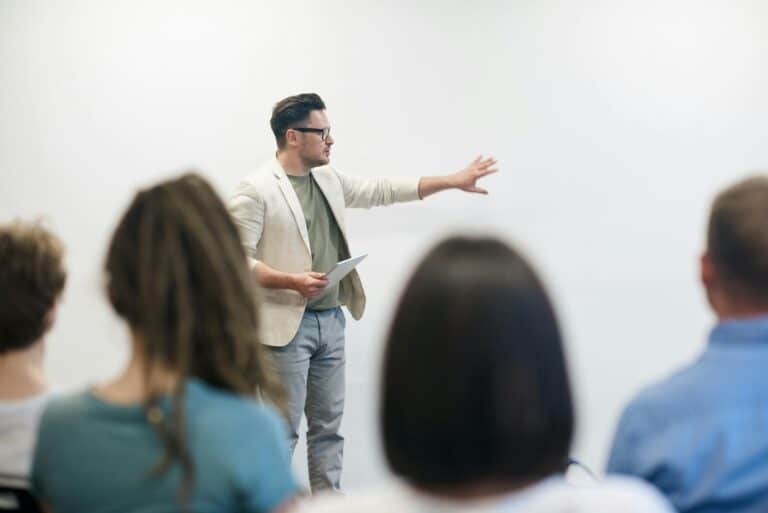 Teacher talking to students