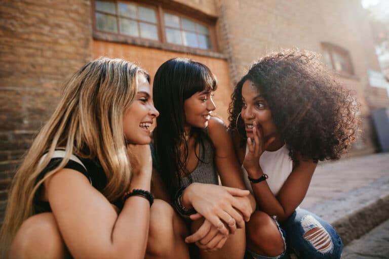 three women gossiping