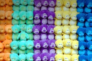 stuffed bears arranged by color