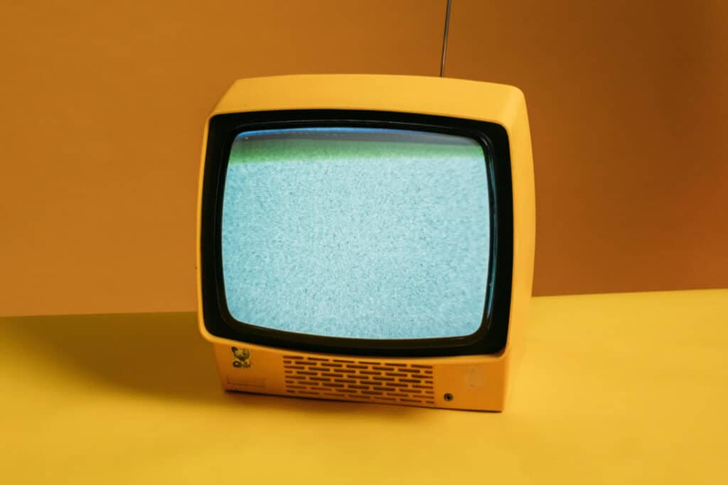 Yellow TV on a yellow background