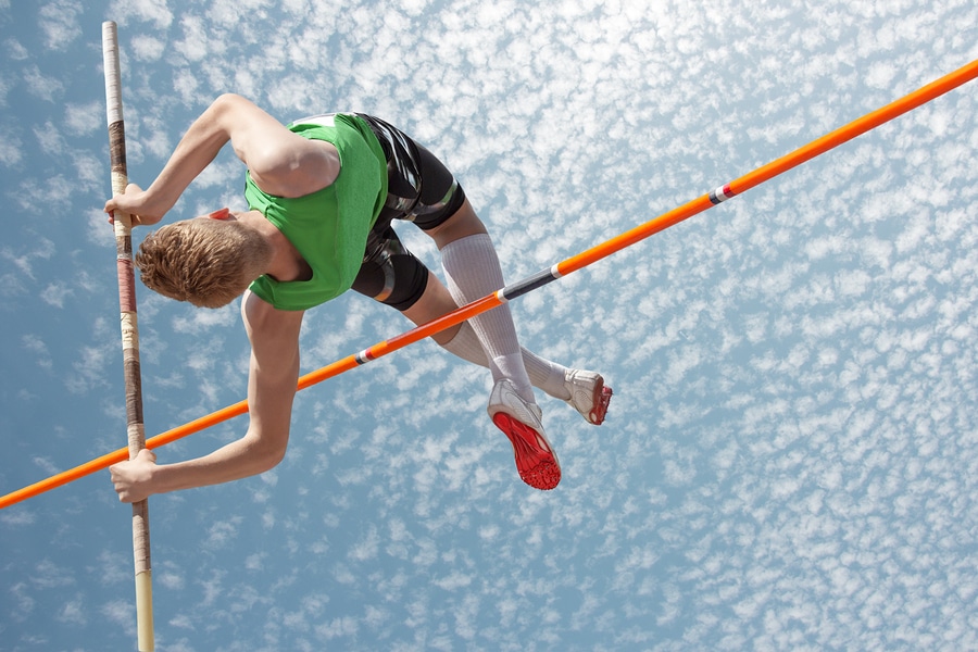 pole vaulter in mid air