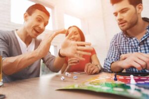 Three adults playing games