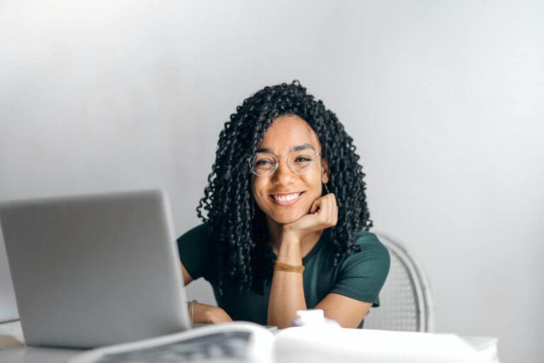 happy girl student with her laptop