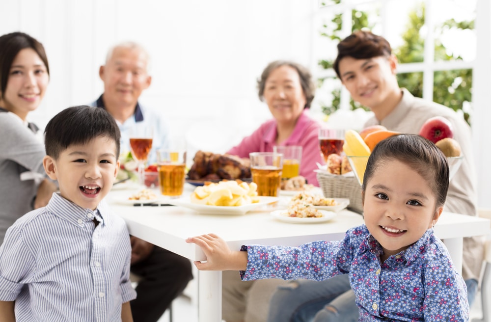 chinese family sitting around table