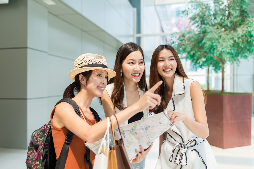 tourist asking chinese people for directions