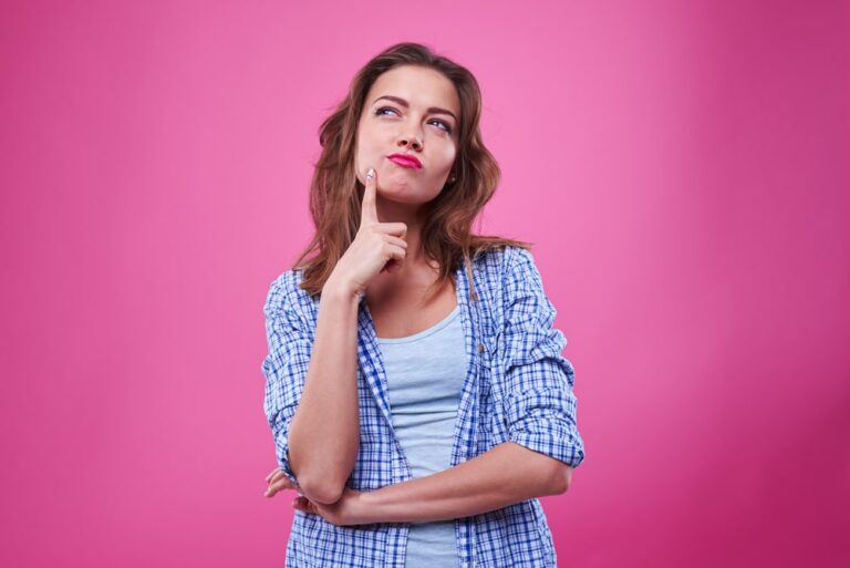 woman-thinking-with-hot-pink-background