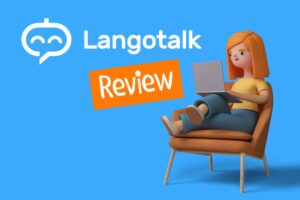 redhead ai woman sitting on a chair with a laptop against a blue background that says "langotalk review"