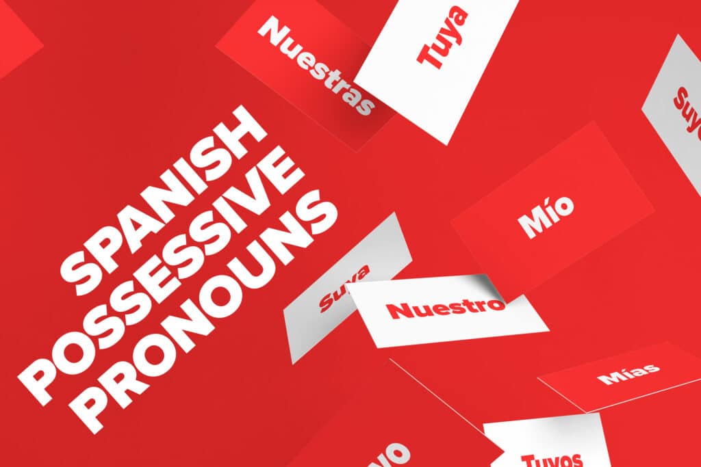 spanish possessive pronouns on flashcards against a red background