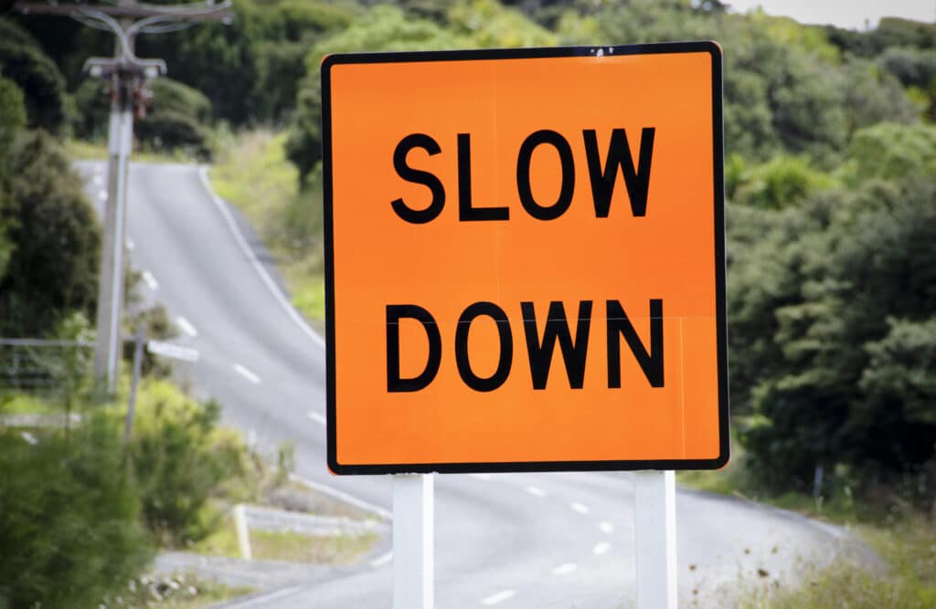 slow-down-road-sign