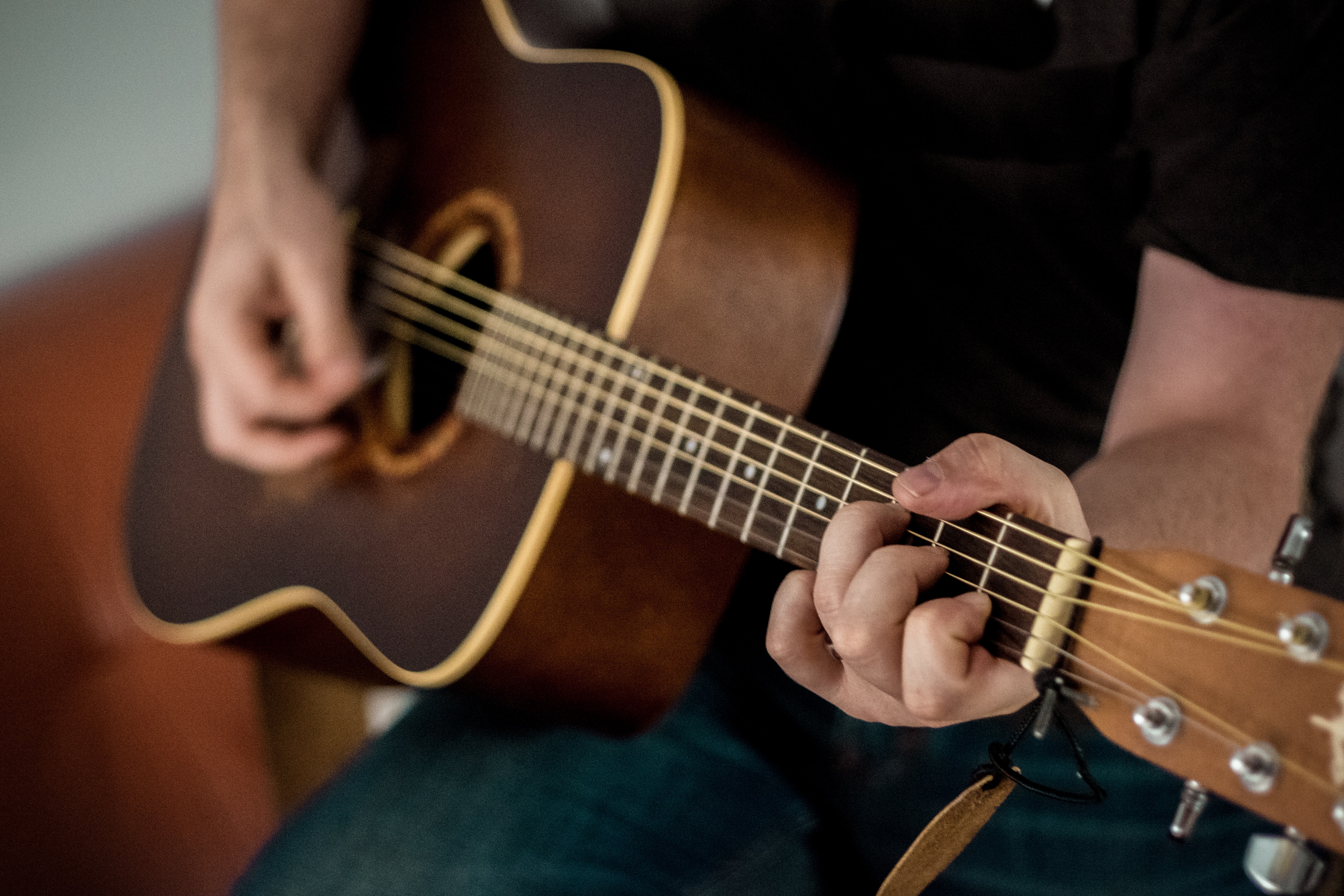 A man playing a guitar