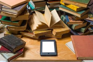 e-reader among old books