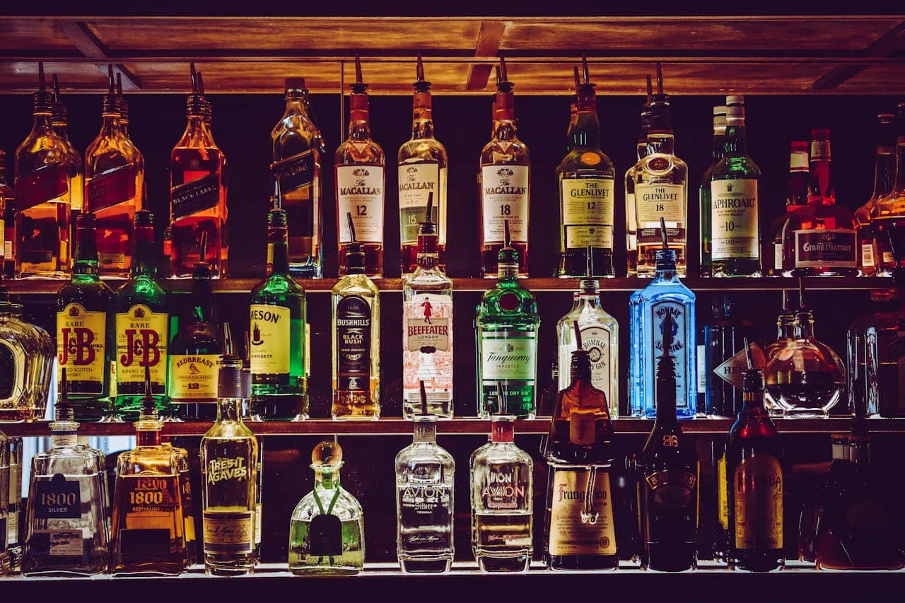 assorted-wine-bottles-behind-bar-counter