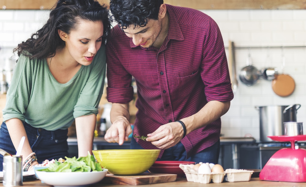 happy-couple-cooking-together