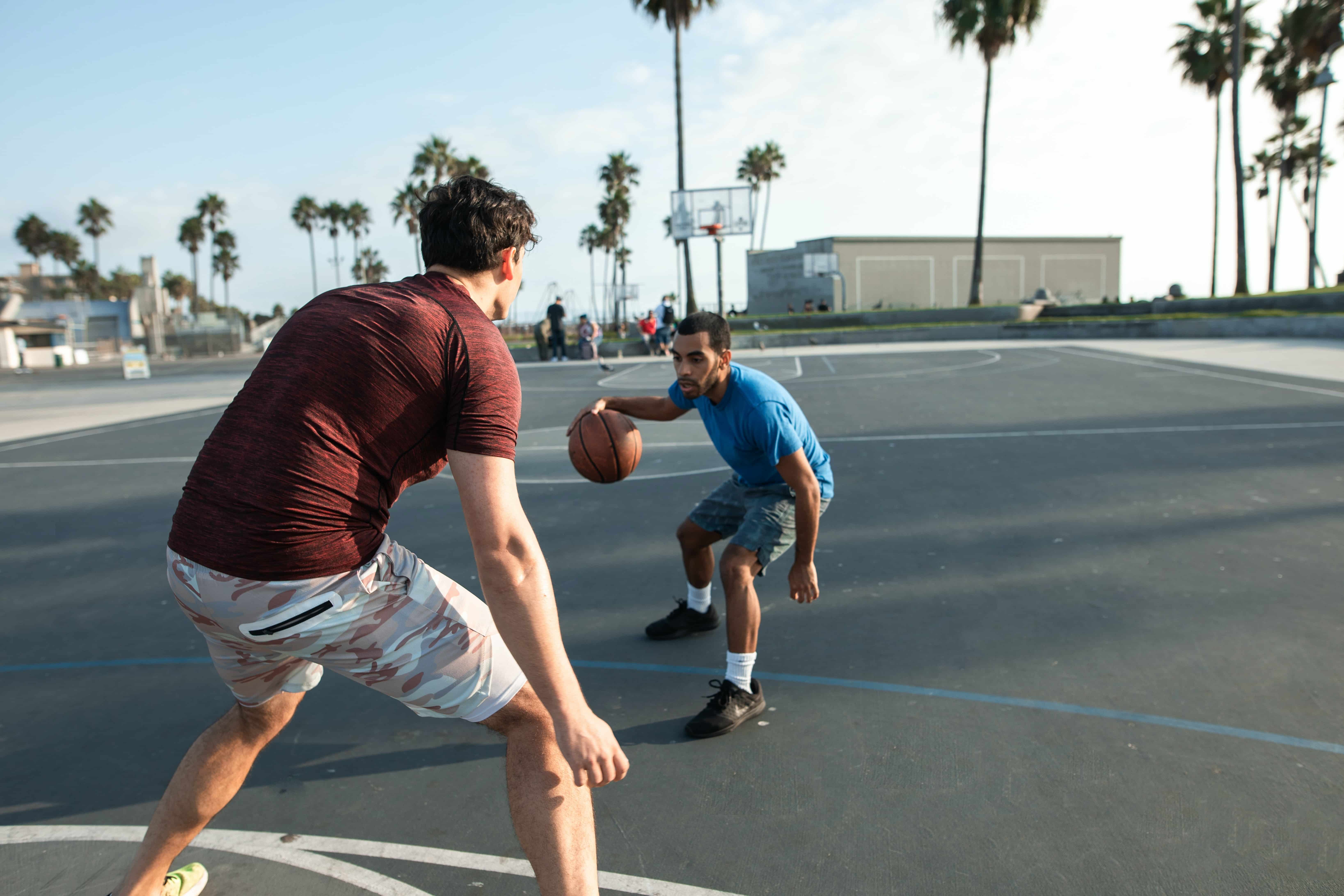 two-men-playing-basketball