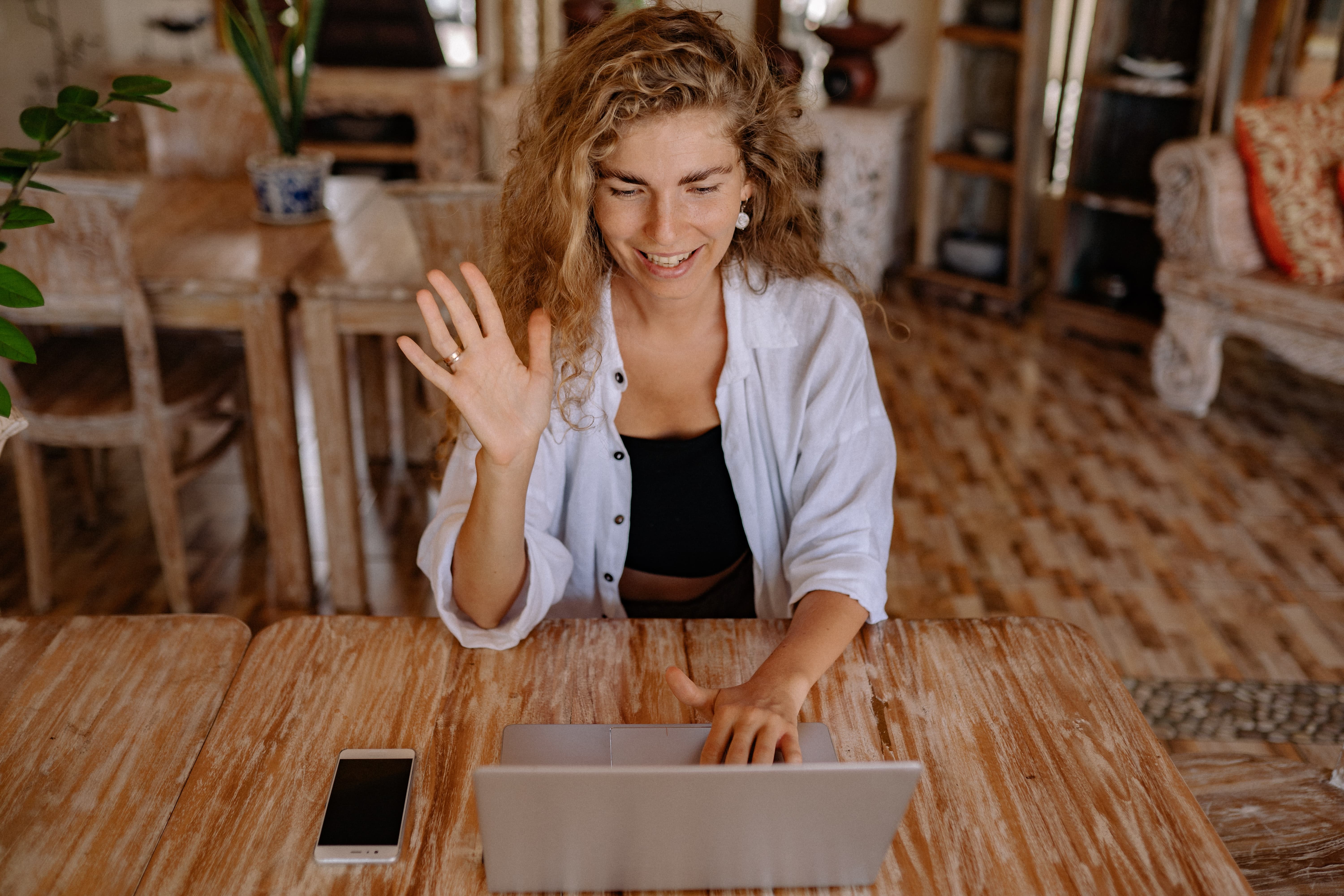 woman-saying-goodbye-on-video-call