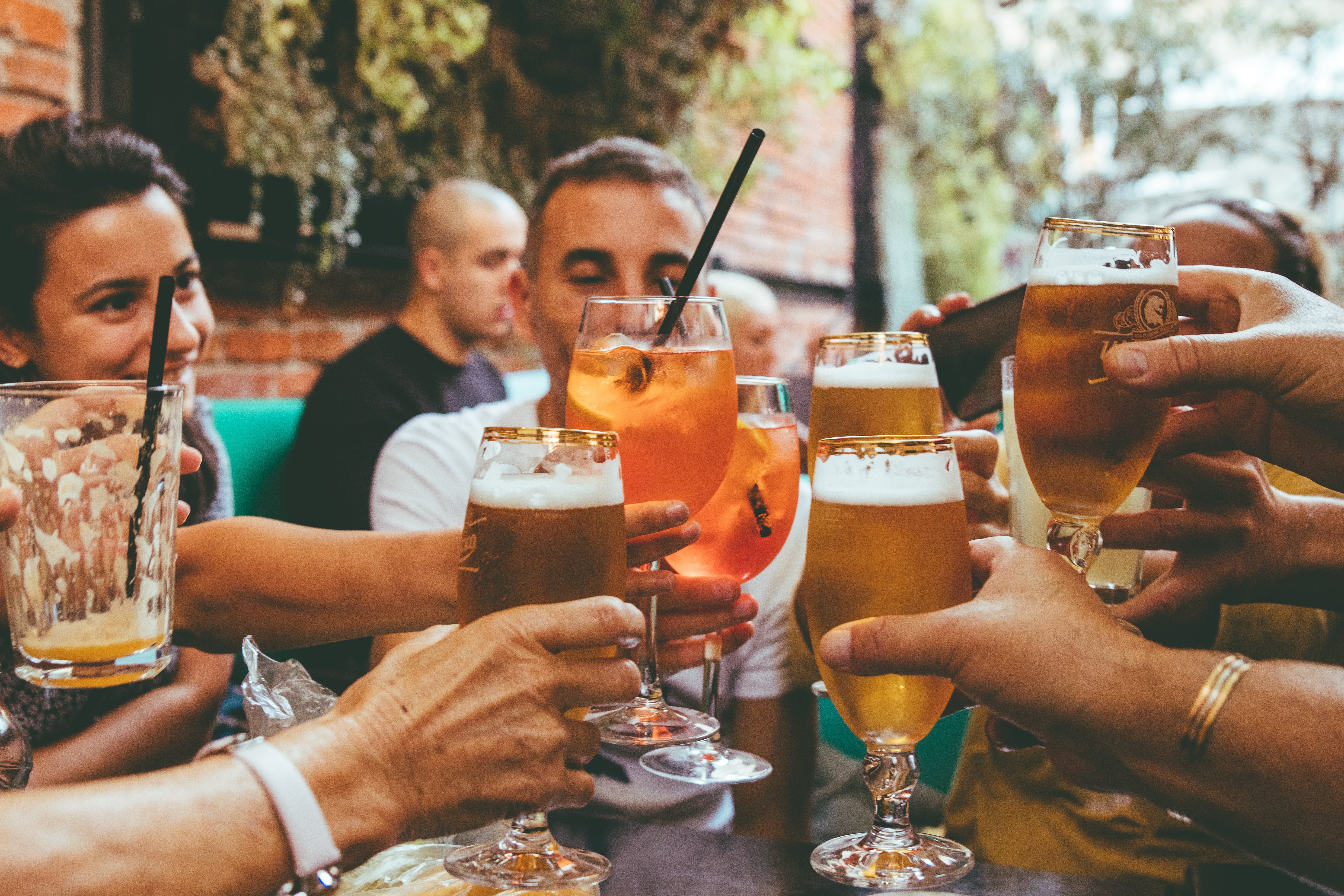 A group of people raising a toast