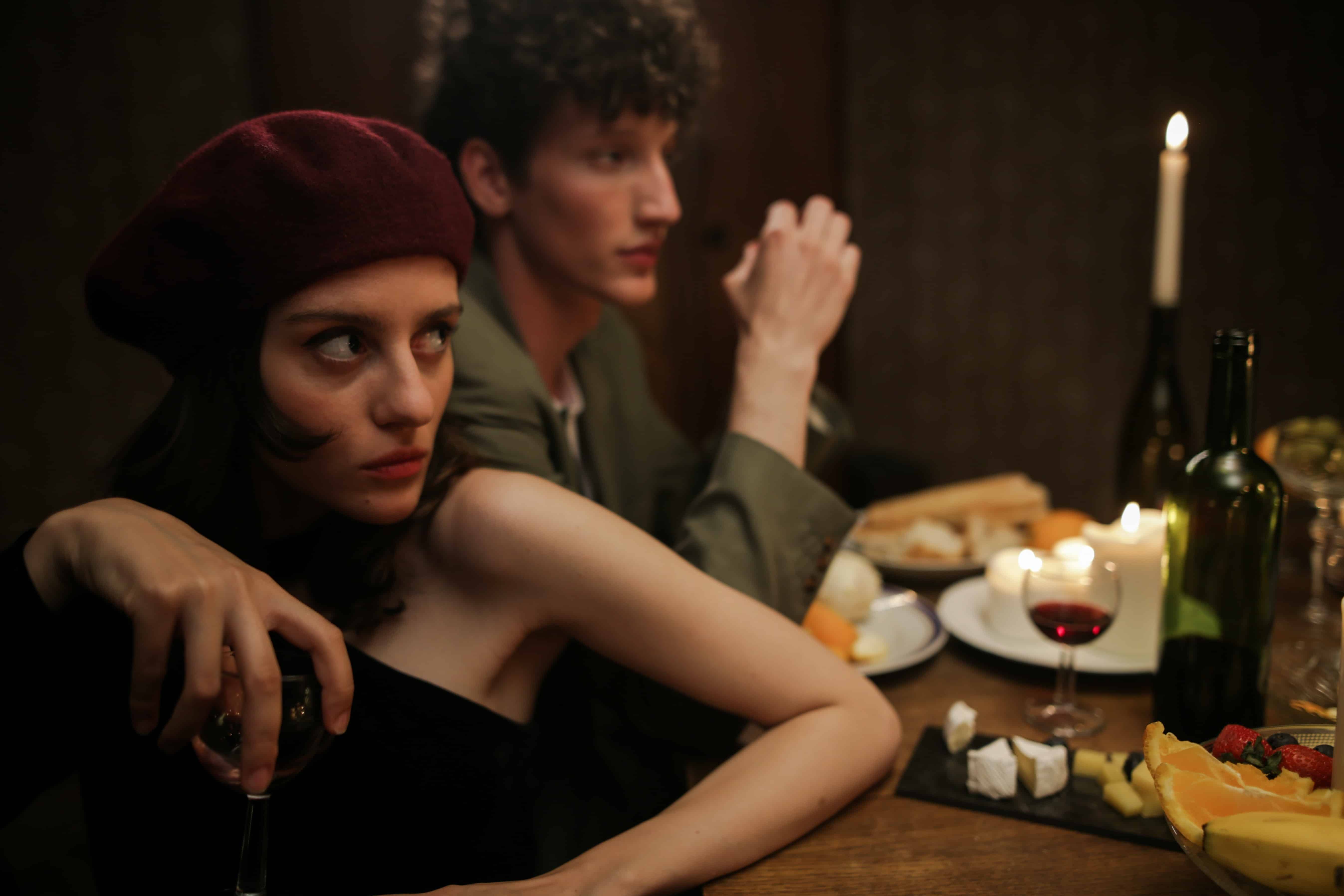 A couple showing French attitude in a cafe