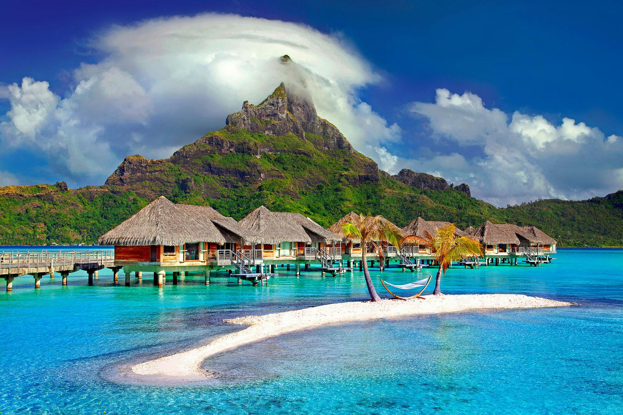 A tropical sea and a mountain in French speaking Tahiti