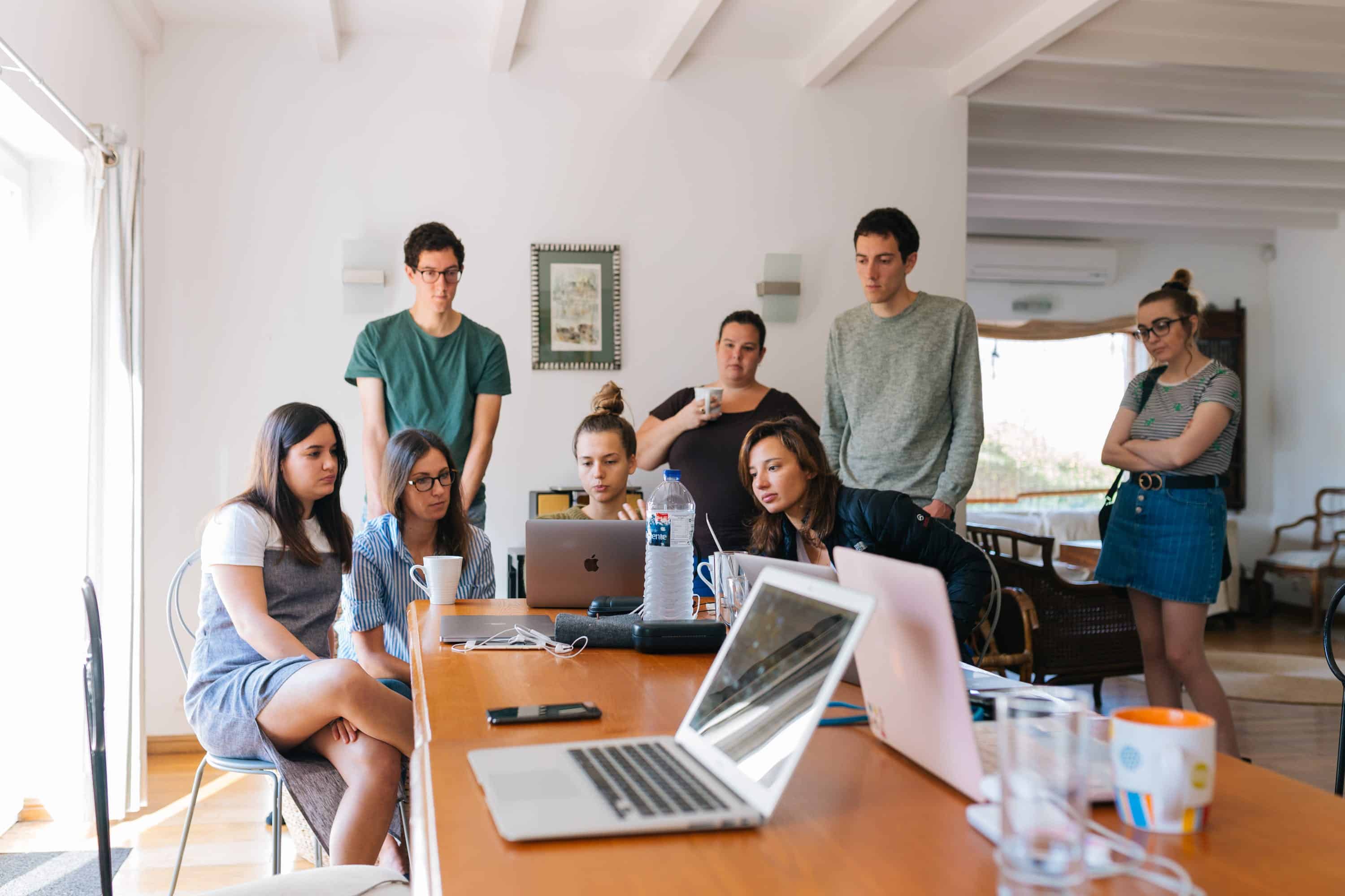 A group of colleagues working in an office together