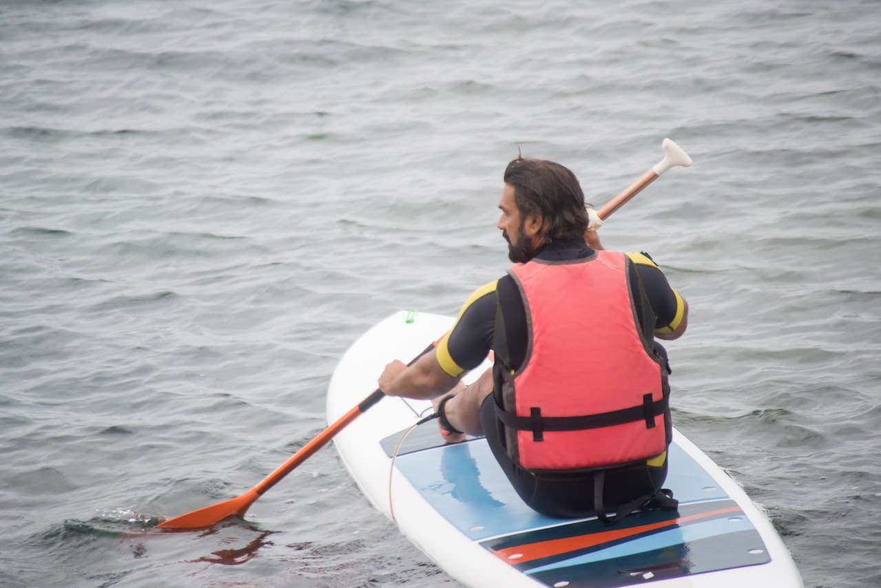 man paddleboarding