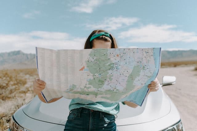 girl holding a map