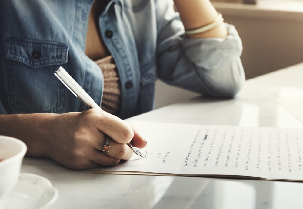 woman-writing-card