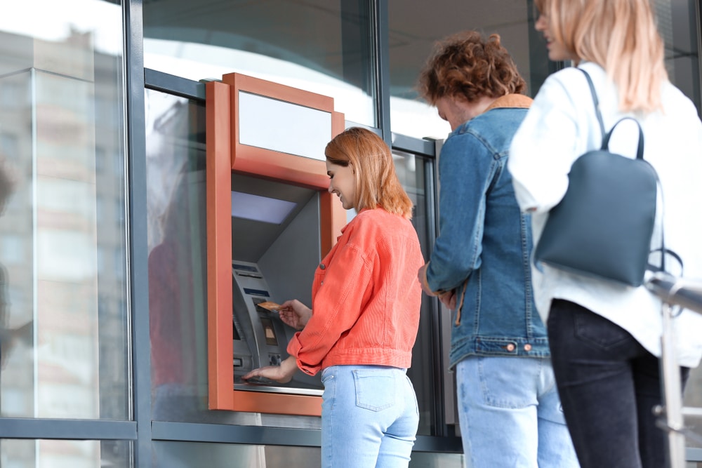 people-standing-in-line-for-ATM