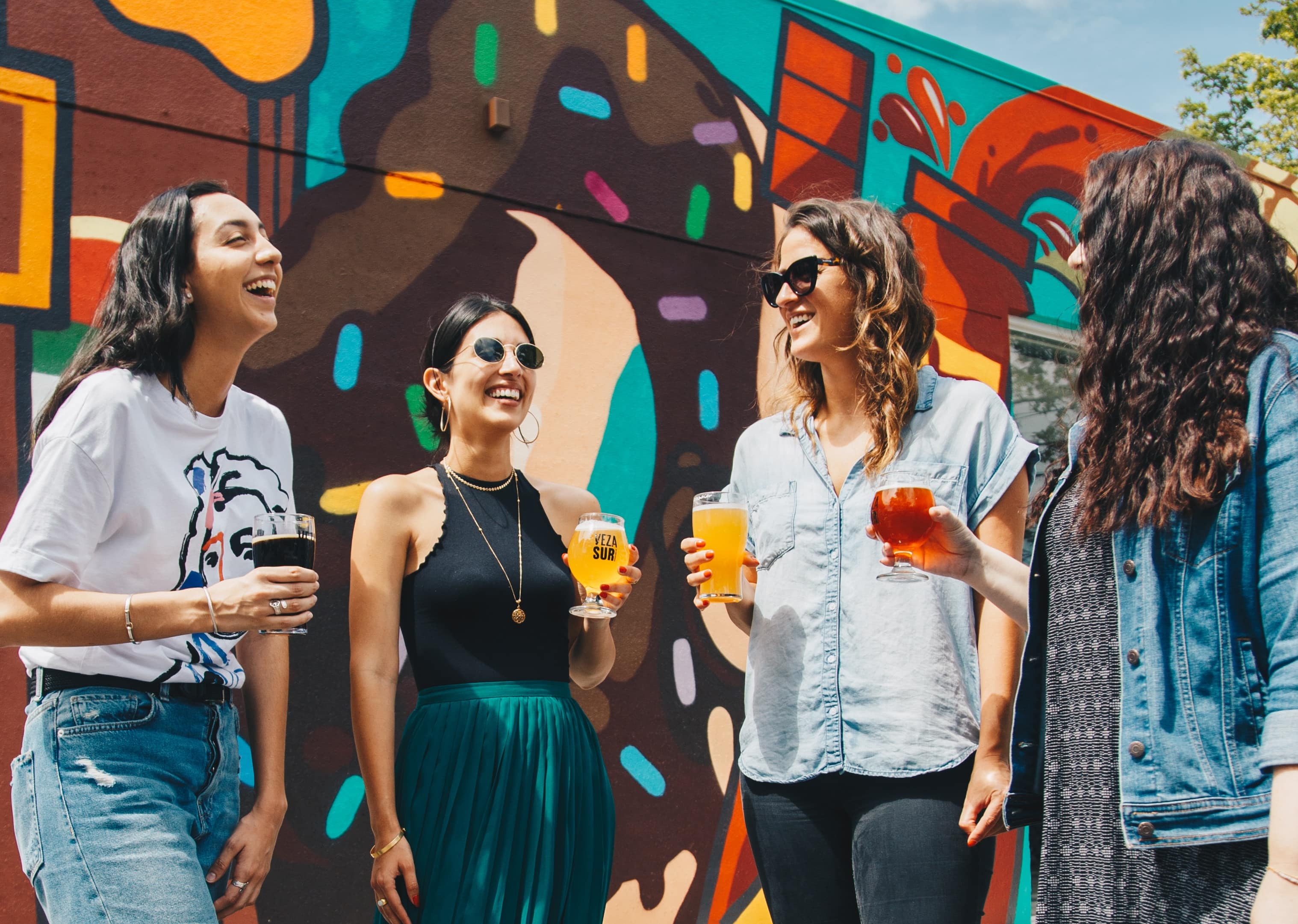 A group of women talking and laughing