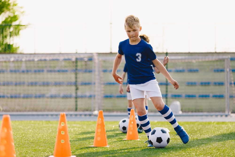 kid playing soccer in germany