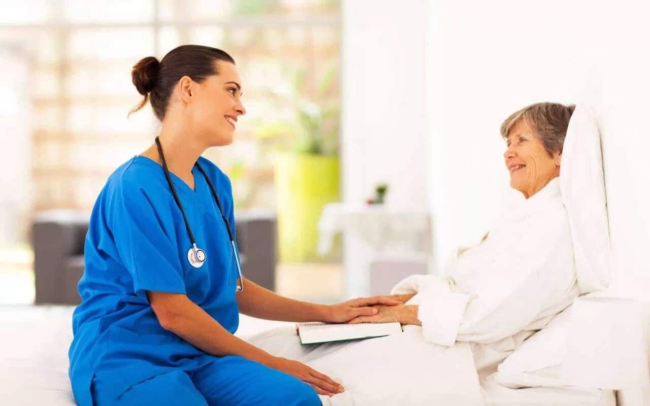 nurse talking to patient