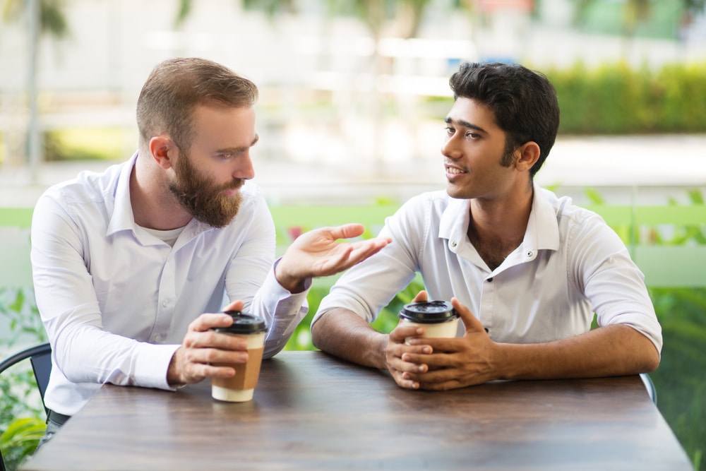 two german friends talking about sports