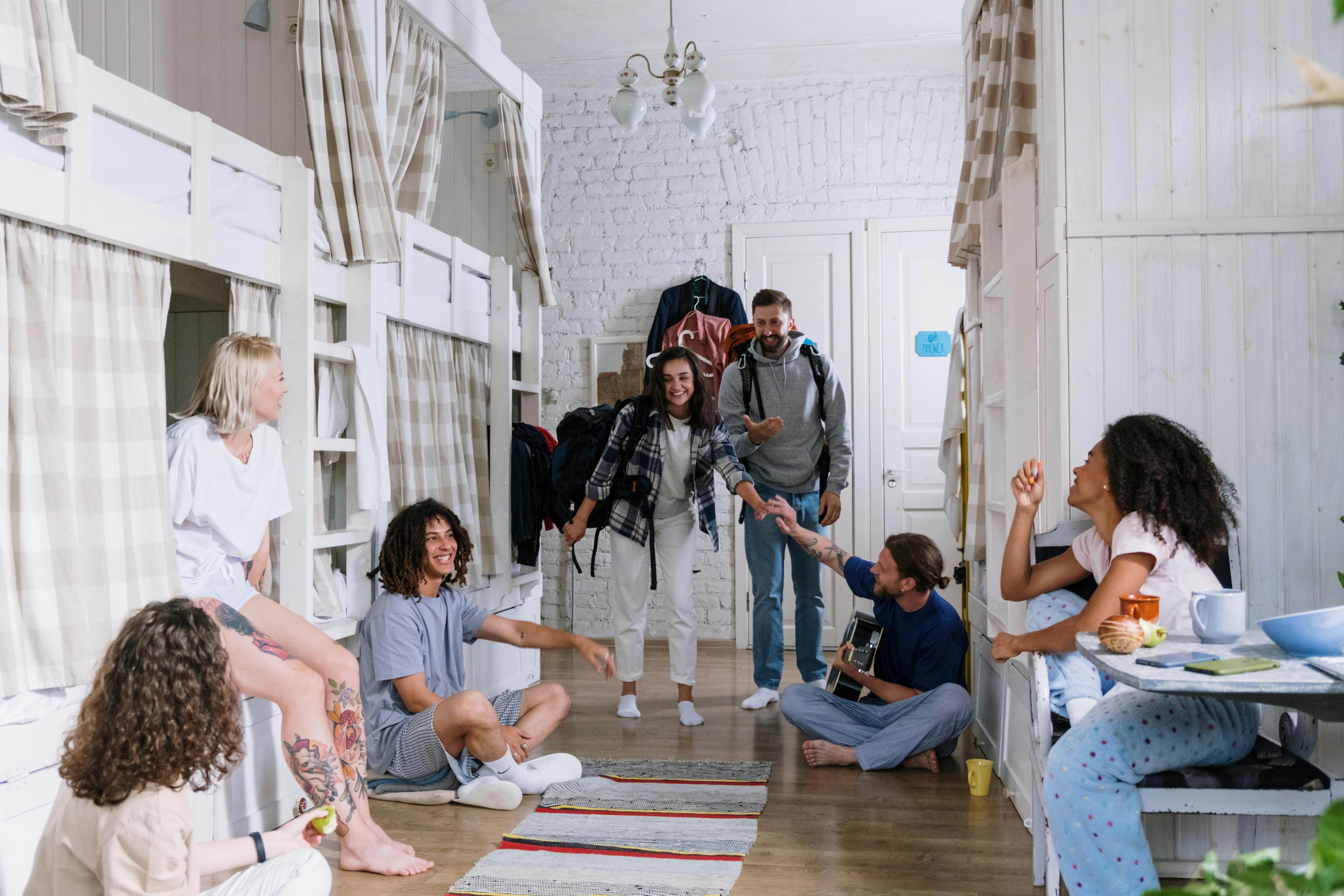 young-people-greeting-each-other-in-dorm