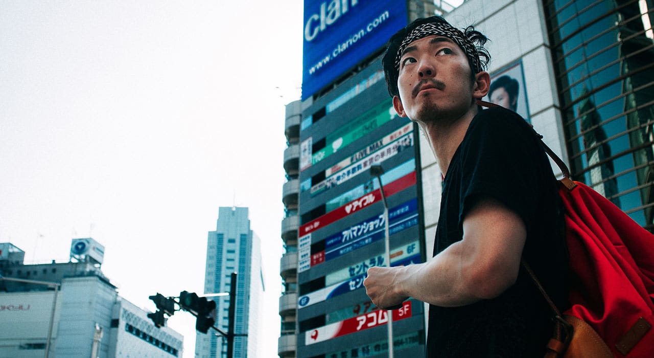 man traveling around in japan