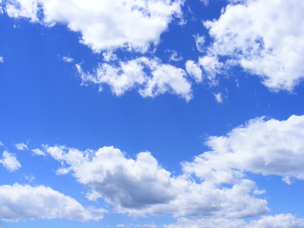 clouds against a blue sky