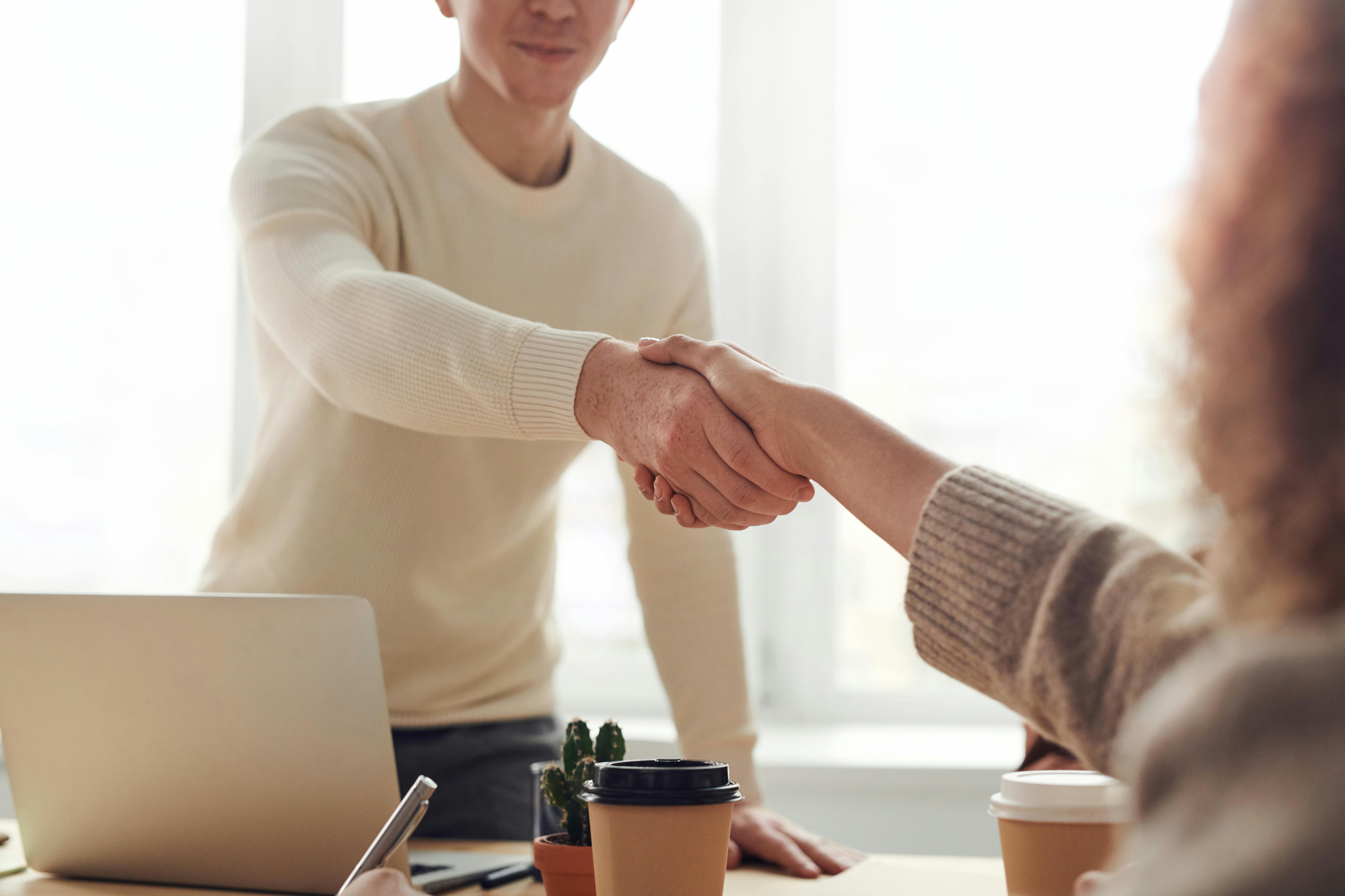 two-people-shaking-hands